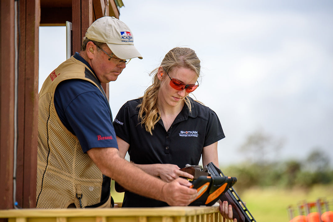 Canadian shooting instructor using ShotKam to help a student understand lead interpretation during a training session.