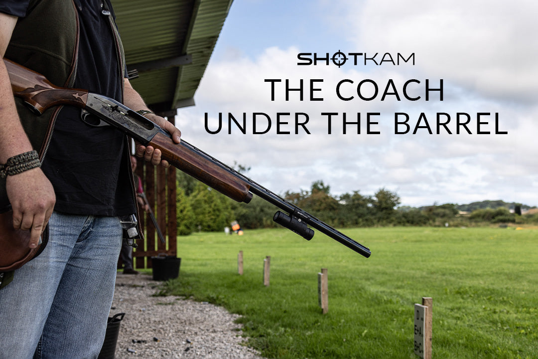 Trapshooting performance in Canada: Shooter holding a ShotKam-equipped shotgun, emphasizing the benefits of coaching from under the barrel.