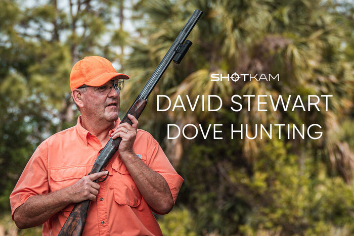 ShotKam image of David Stewart preparing for dove hunt with shotgun in hand.
