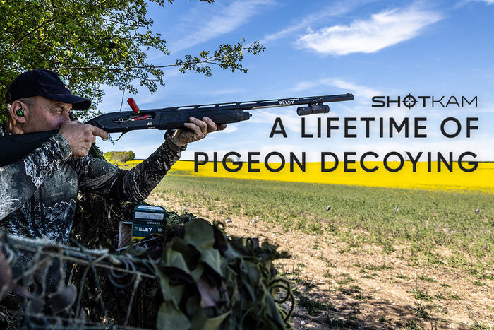ShotKam blog thumbnail featuring Geoff Garrod pigeon decoying in the UK with a shotgun aimed from a field hide.