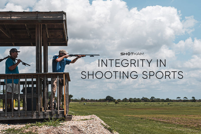 Canadian shooters demonstrating integrity in shooting sports while practicing clay shooting with ShotKam gear at a local shooting range.