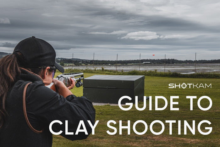 ShotKam guide to clay shooting featuring a woman at a shooting range