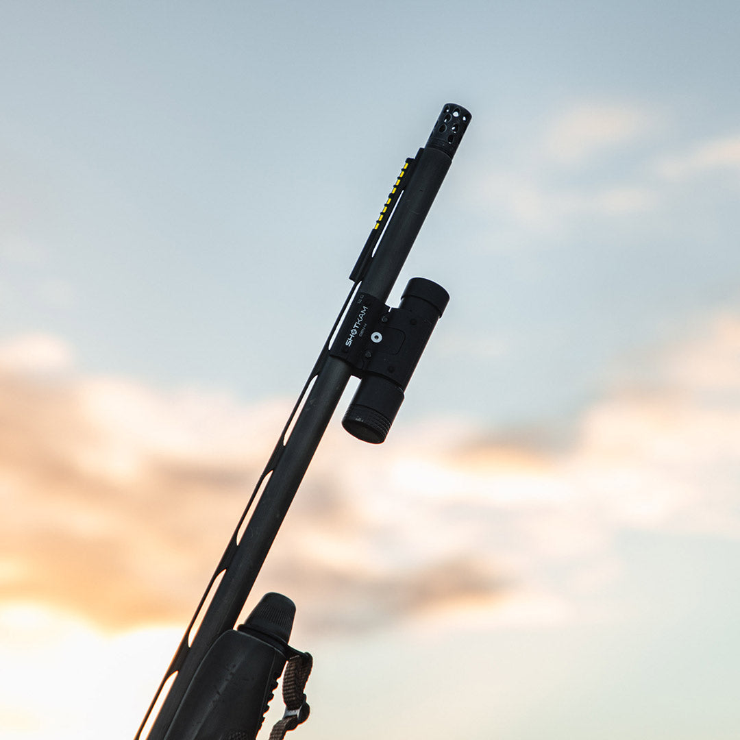 ShotKam Gen 4 mounted on a hunting shotgun at sunset in Canada. This HD gun camera is perfect for waterfowl, upland, and big game hunting, recording every shot for review.